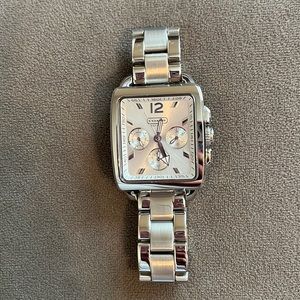 Coach, women’s silver watch.